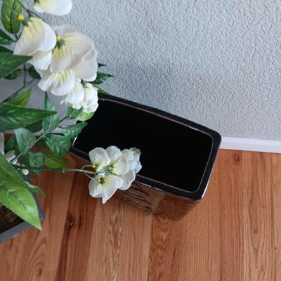 FAUX FLOWERING PLANT AND A FLOOR VASE