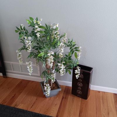 FAUX FLOWERING PLANT AND A FLOOR VASE