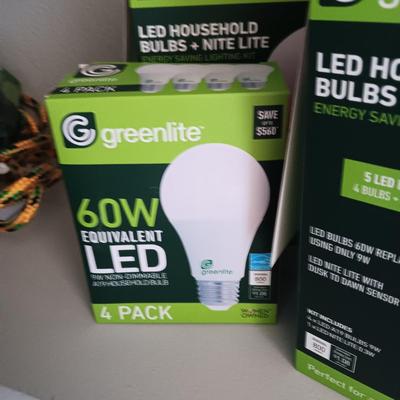 5 FULL BOXES OF LED 60W LIGHT BULBS WITH DUSK TO DAWN SENSOR