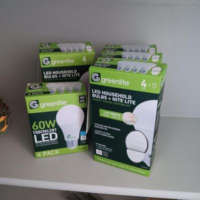 5 FULL BOXES OF LED 60W LIGHT BULBS WITH DUSK TO DAWN SENSOR