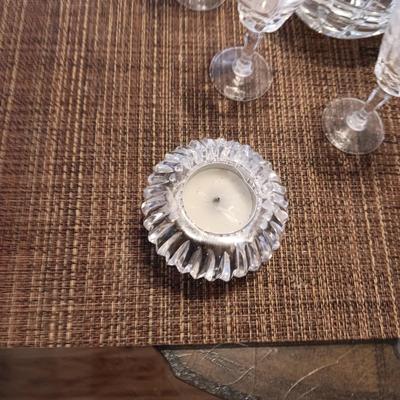 CRYSTAL DECANTER, 5 SMALL STEMMED GLASSES AND CRYSTAL VOTIVE CANDLE HOLDERS