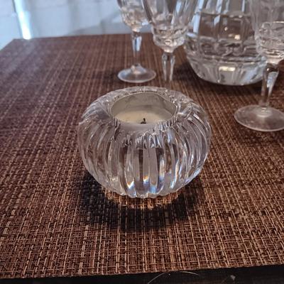 CRYSTAL DECANTER, 5 SMALL STEMMED GLASSES AND CRYSTAL VOTIVE CANDLE HOLDERS