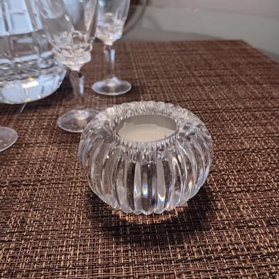 CRYSTAL DECANTER, 5 SMALL STEMMED GLASSES AND CRYSTAL VOTIVE CANDLE HOLDERS