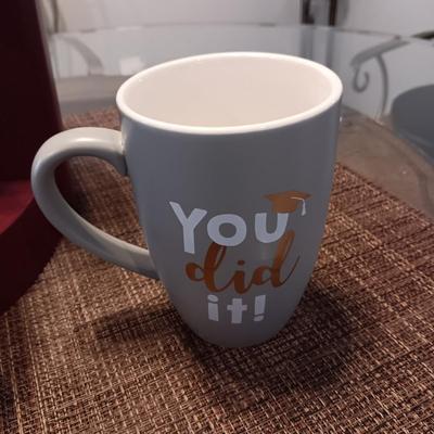 KEURIG COFFEE BREWER AND A COLLECTION OF STARBUCKS AND OTHER MUGS