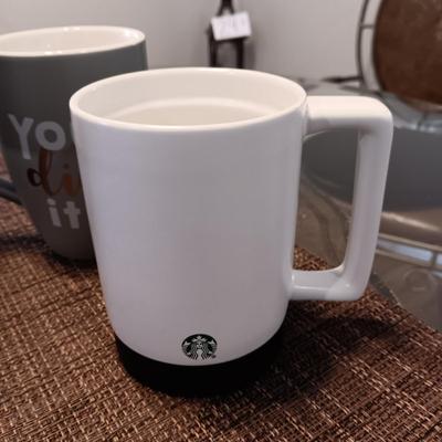 KEURIG COFFEE BREWER AND A COLLECTION OF STARBUCKS AND OTHER MUGS