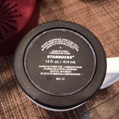 KEURIG COFFEE BREWER AND A COLLECTION OF STARBUCKS AND OTHER MUGS
