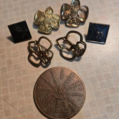Sale Photo Thumbnail #80: This is a grouping of Scouting Collectibles for cub scouts, boy scouts and girl scouts.  Includes the Oath Challenge Coin, Girl Scout Lapel   Pins and a Cub Scout and Bob Scout Lapel Pins.  Nice collection.