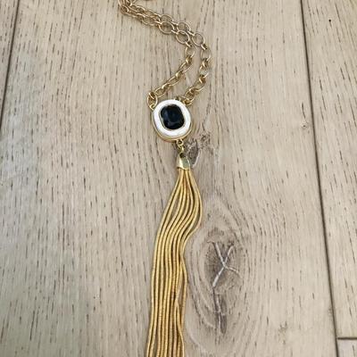 Vince Camuto Gold tone, tassel, white stone necklace, and emerald green rhinestone