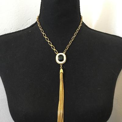 Vince Camuto Gold tone, tassel, white stone necklace, and emerald green rhinestone