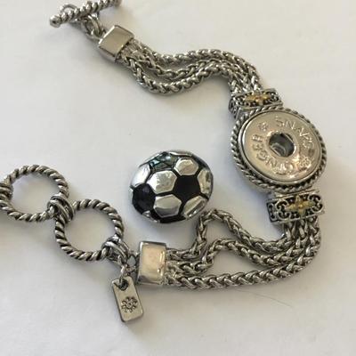 Very nice Silvertone ginger snaps cable chain toggle bracelet. Very nice quality.