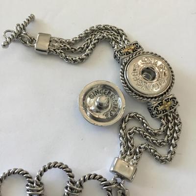 Very nice Silvertone ginger snaps cable chain toggle bracelet. Very nice quality.