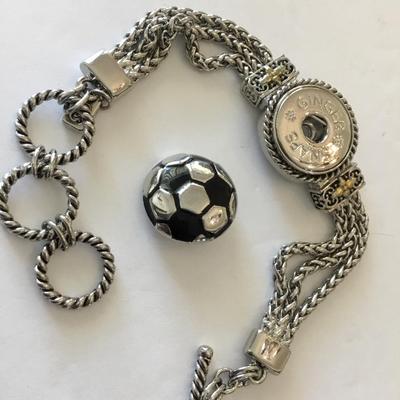 Very nice Silvertone ginger snaps cable chain toggle bracelet. Very nice quality.