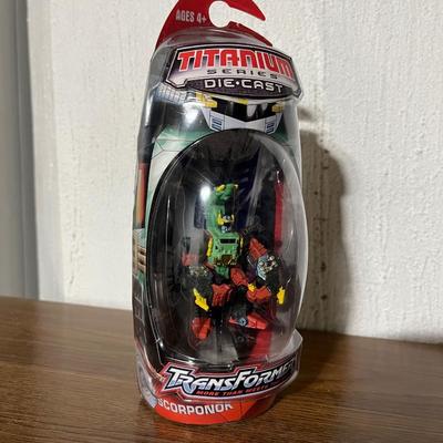 Sale Photo Thumbnail #384: New in box die cast metal scorponok figure from transformers titanium series.

*shipping available at buyers expense