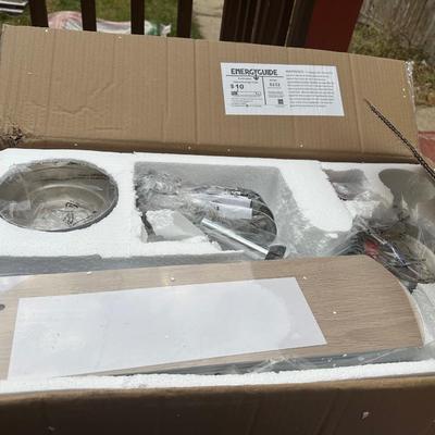 Sale Photo Thumbnail #84: New in box and includes remote & 2 Color Options Blades in chrome.  Takes 3 e26 60 watt bulbs (not included)