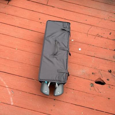 Sale Photo Thumbnail #191: Pack n play is in great condition and has built in carry handle once folded up for easy transportation.