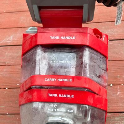 Sale Photo Thumbnail #162: The machine is a powerful, upright carpet cleaner designed for home use, providing professional-grade results by removing embedded dirt and grime.