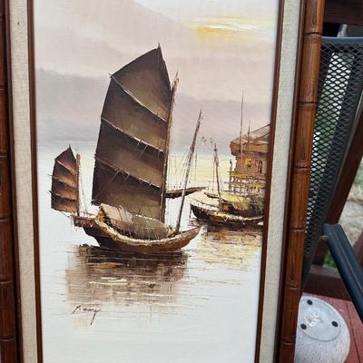 Sale Photo Thumbnail #96: The painting depicts traditional Chinese vessels known as "junk" boats in a seascape.