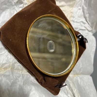 Sale Photo Thumbnail #205: Vintage Round Gold Tone Purse Pocket Mirror with Pouch & Box Leaf Pattern.

*shipping available at buyers expense
