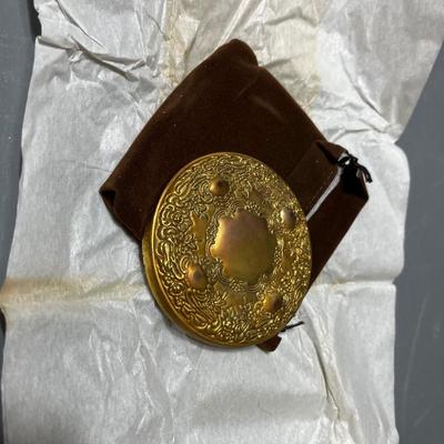 Sale Photo Thumbnail #204: Vintage Round Gold Tone Purse Pocket Mirror with Pouch & Box Leaf Pattern.

*shipping available at buyers expense
