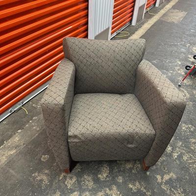 Sale Photo Thumbnail #109: This is an upholstered accent chair with a geometric pattern. Chair has some indents in the cushion that should return to normal after some time.