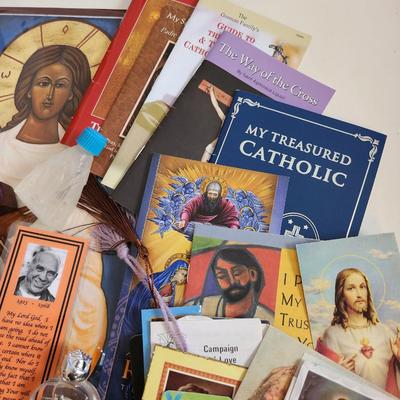 Sale Photo Thumbnail #135: This unique lot is chocked full of Religious Items.  Filled with icons, booklets, pamphlets, medals, scapulars, holy water containers, a plethora of crosses, many holy cards, prayer cards and themed bookmarks. Plus a nice set of praying hands carved from 