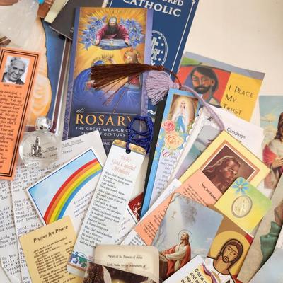Sale Photo Thumbnail #137: This unique lot is chocked full of Religious Items.  Filled with icons, booklets, pamphlets, medals, scapulars, holy water containers, a plethora of crosses, many holy cards, prayer cards and themed bookmarks. Plus a nice set of praying hands carved from 