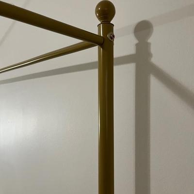 Sale Photo Thumbnail #108: This Queen size French Country Style Four Poster Metal Canopy Bed in Gold Finish showcases four posters for a stately, French country look in your bedroom. The clean-lined frame is crafted from stainless steel in a neutral finish, and it rests on round, 6