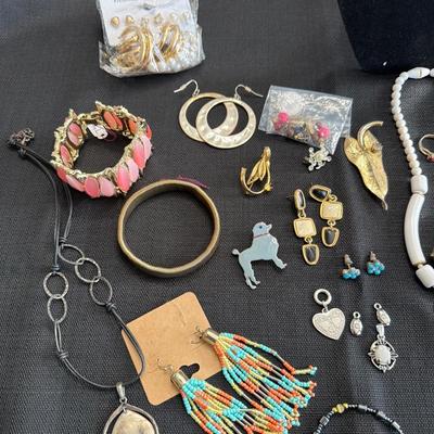 Sale Photo Thumbnail #50: Vintage Jewelry, Rosary, Earrings, Pins, Bracelets and more.