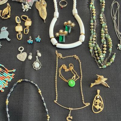 Sale Photo Thumbnail #52: Vintage Jewelry, Rosary, Earrings, Pins, Bracelets and more.