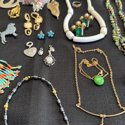 Sale Photo Thumbnail #55: Vintage Jewelry, Rosary, Earrings, Pins, Bracelets and more.