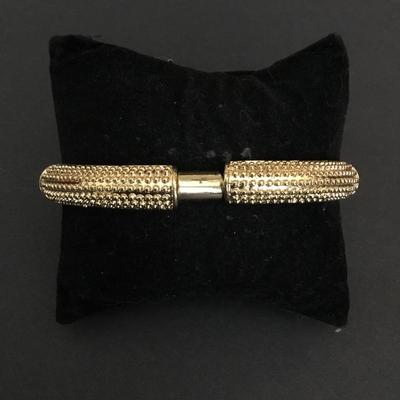 Cute gold tone, heavy metal hob knob, stretch bracelet