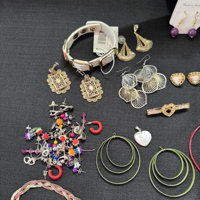 Sale Photo Thumbnail #90: Necklaces
Earrings
Bracelets
Brooches