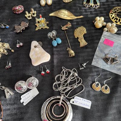 Sale Photo Thumbnail #100: Necklaces
Bracelets
Earrings
Brooches