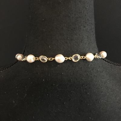 Beautiful vintage, goldtone, faux pearl faux glass caged bead necklace. Excellent condition.