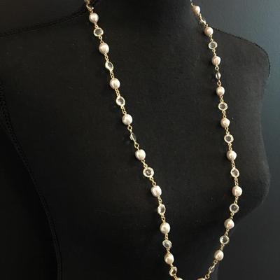 Beautiful vintage, goldtone, faux pearl faux glass caged bead necklace. Excellent condition.