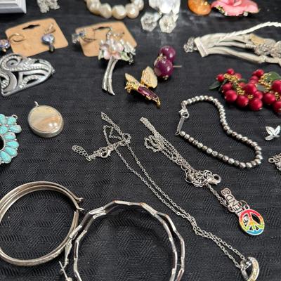 Sale Photo Thumbnail #127: Humming bird Pin, Broach, Earrings, Necklaces, bracelets.