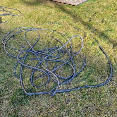 Sale Photo Thumbnail #383: Two garden hoses with no leaks on the connections on either end of the hose.