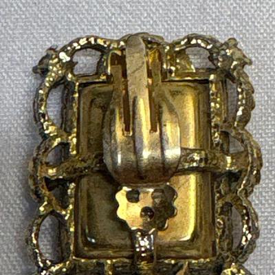 Large emerald-green clip-on earrings