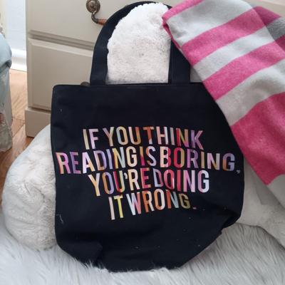 LOT 52: Faux Fur Rug, Back Rest & Stool along with Books