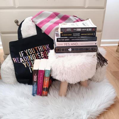 LOT 52: Faux Fur Rug, Back Rest & Stool along with Books