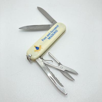 LOT 77: Free Mason Zippo Lighters and Five Military / Utility Folding Pocket Knives