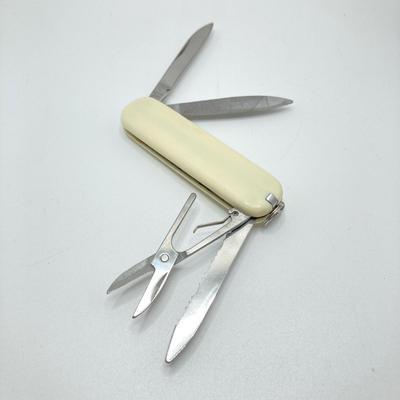 LOT 77: Free Mason Zippo Lighters and Five Military / Utility Folding Pocket Knives