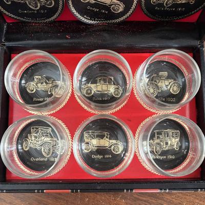 LOT 110: Set of 6 Liquor Glasses & Coaster in a Book Style Box along with Etched Polka Dot Glassware