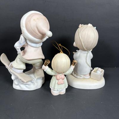 LOT 127: Holiday Figurines Collection: 1984 Cabbage Patch, Precious Moments, Santa Stocking Holders, Enesco & More