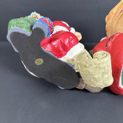 LOT 127: Holiday Figurines Collection: 1984 Cabbage Patch, Precious Moments, Santa Stocking Holders, Enesco & More