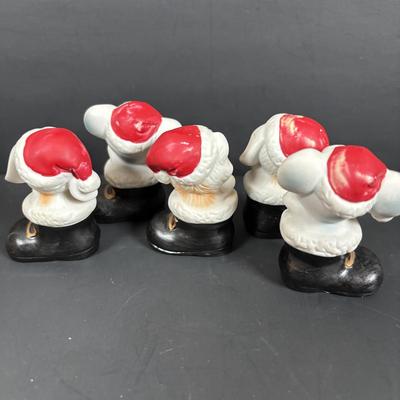 LOT 127: Holiday Figurines Collection: 1984 Cabbage Patch, Precious Moments, Santa Stocking Holders, Enesco & More