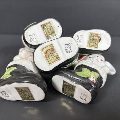 LOT 127: Holiday Figurines Collection: 1984 Cabbage Patch, Precious Moments, Santa Stocking Holders, Enesco & More