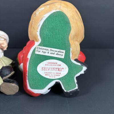 LOT 127: Holiday Figurines Collection: 1984 Cabbage Patch, Precious Moments, Santa Stocking Holders, Enesco & More