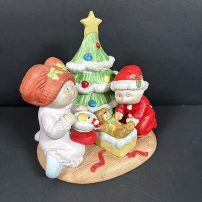LOT 127: Holiday Figurines Collection: 1984 Cabbage Patch, Precious Moments, Santa Stocking Holders, Enesco & More