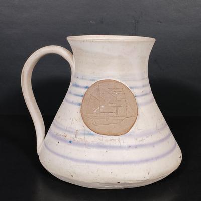 LOT 161: Nautical-Themed Signed Art Pottery with Metal Wall Display